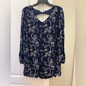 Long sleeve navy and white embroidered mini dress. Brand: Soprano. Size: L.